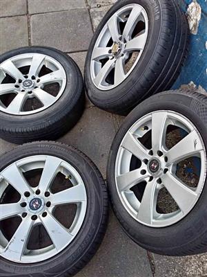 Set of 15 inch multiple 4 holes racing rims with tyres for sell 
