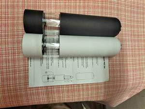 Battery operated salt and pepper grinder