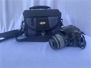  Sony Alpha DSLR-A230  Digital Camera with a battery and charger