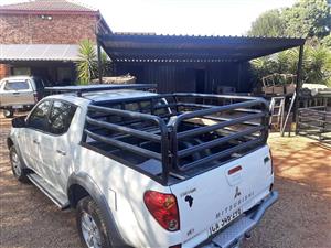 Triton double cab cattle rail