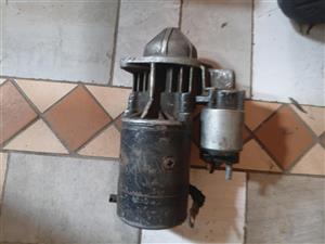 Nissan np300 2.4 starter used and in good condition 