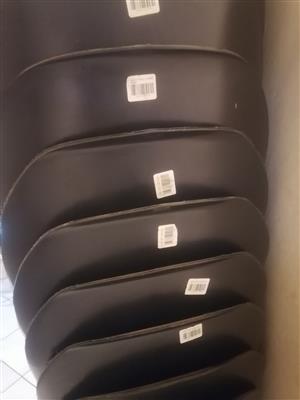  black plastic chairs, still new, I need space in my house 