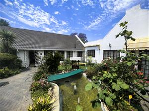 Charming Cottage-Style Home with 3 Income-Generating Cottages