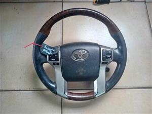 Toyota Prado J150 series steering wheel with airbag for sale WhatsApp or cell 