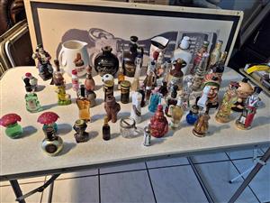 Large, diverse collection of vintage miniature liquor bottles and related bar accessories.
