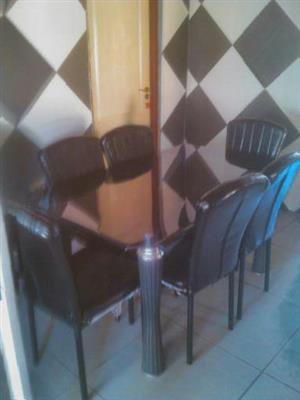 Selling a Glass Table and chairs