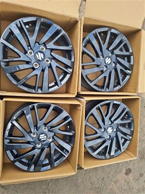 Suzuki cererio  original alloy mags size 15 aset