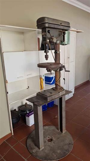 Industrial drill press for sale.