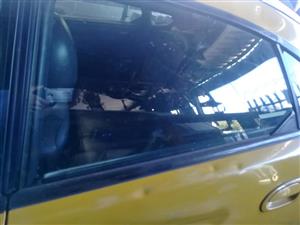 MADZA ASTINA LEFT REAR DOOR GLASS