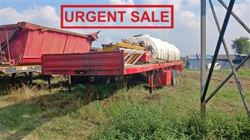 2004 TOP TRAILER TRI-AXLE FLATDECK TRAILER