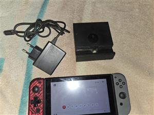 Nintendo Switch V1 (Dock and Charger included) Price Negotiable