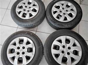 4 X Original standard 14 inch Hyundai Accent & Grand i20 steel rims , tyres and wheel caps for sell
