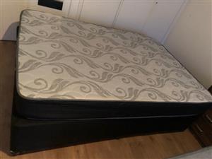 Queen bed with a free glass coffee table 