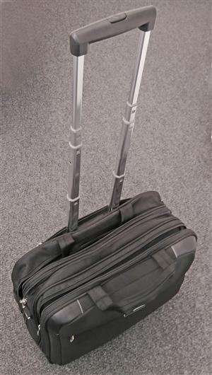Computer bag with four compartments and wheels
