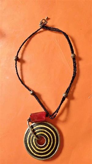 Concentric snare necklace