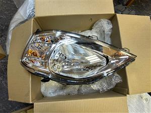 Brand new Original NP200 Left Headlight