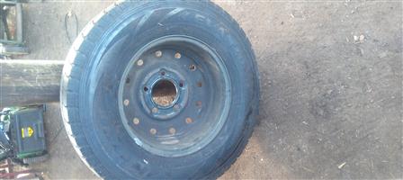 Tyre with rim for sale