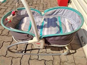 Tiny Love Vibrating Baby Rocker Bassinet with Musical Mobile (Teal & Grey)