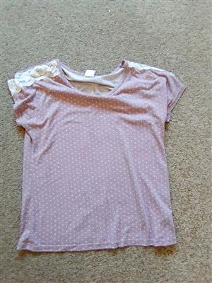 Purple and white polka dot top