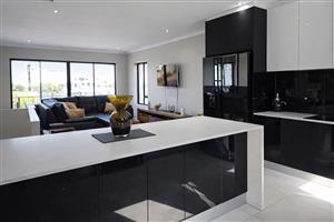 Secure Coastal Triplex with Income Potential & Views