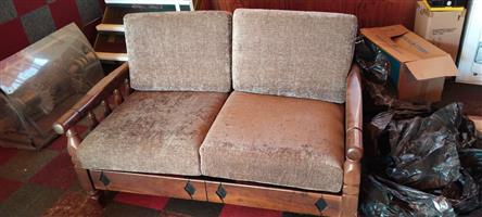 Wooden grey lounge suite with coffee table