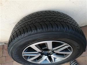 18'' Toyota Hilux/Fortuner mag with used 265/60/18 Dunlop tyre for