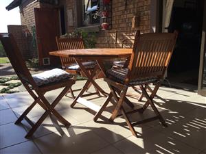 Wooden slatted table and 4 chairs