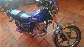 Suzuki 125 cc in good condition with papers