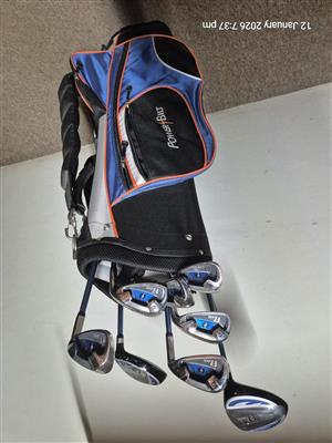 Golf clubs and shoes 