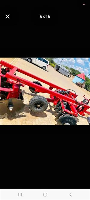Hydrolic disc harrow