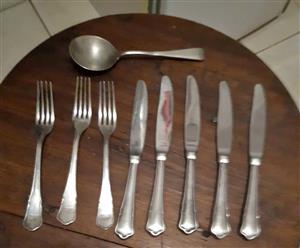 Antique Silver knifes, spoon and forks.  Plated.