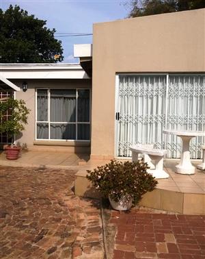 LOCK-UP & GO STAND ALONE UNIT , CLOSE TO SANDTON CBD , SAFE IN BOOMED SUBURB.