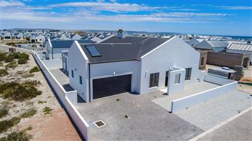 Modern Home with Separate Guest Suite in Secure Coastal Estate