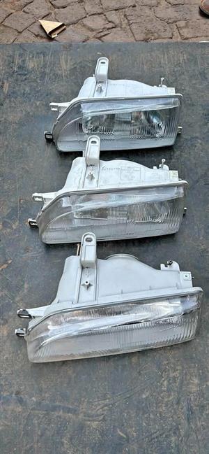 Toyota Corolla E 90-92 Left Headlights For Sale @Circle 7 Used Parts Call Or WhatsApp