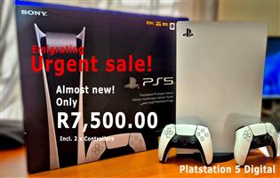 Sony PS5 Digital with controllers. 