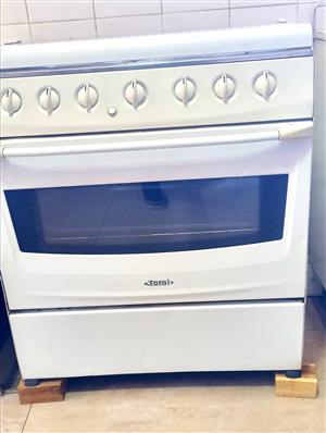 6-Burner TOTAL  Gas Stove with large Oven.Glass fold-down Cover. 