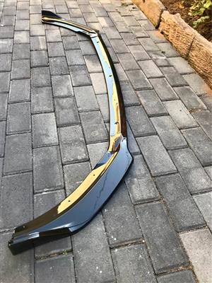 Polo 8 3 piece gloss black plastic front spoiler