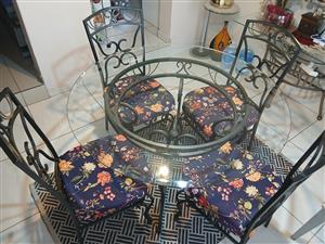 Dinning table for 4. Table size-120m by 79m. Comes with 4 matching u