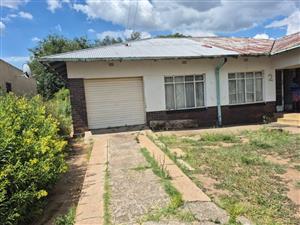 Calling all home renovators! This property is full of potential and needs some TLC.
