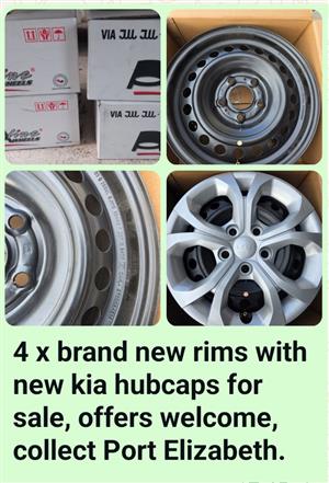A set of 4 new rims with kia hubcaps R2000, collect in Port Elizabeth, R2000