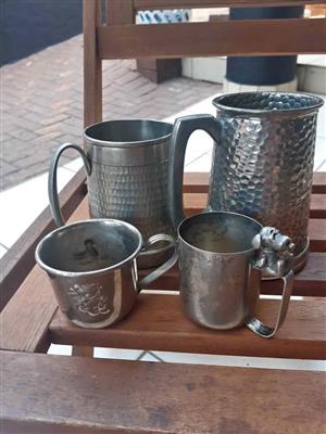 Antique Pewter beer mugs x 2 one with glass bottom.  