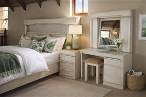 Matching mirror vanity table and bed with extended headboard