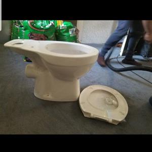 White toilet with toilet seat