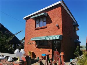 Neat facebrick home with amazing sea views