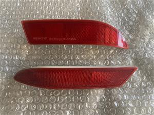 2009 DAIHATSU TERIOS REAR BUMPER REFLECTORS FOR SALE. IN PRISTINE CONDITION