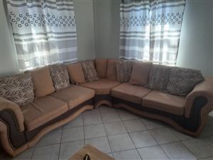 Brown L shaped couch