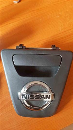 NP200 TAILGATE HANDLE. BRAND NEW. FOR VARIOUS OTHER CARS TOO.