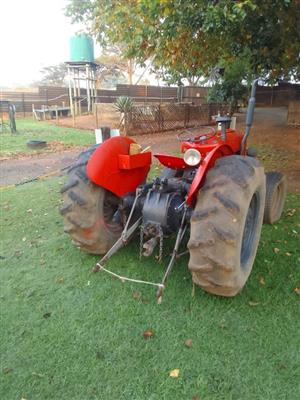 Tractor Massey Fergusson 35 with farm implements