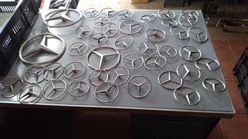 M Benz boot and grill badges