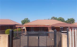 Secure and Family-Friendly Home in Gated Estate